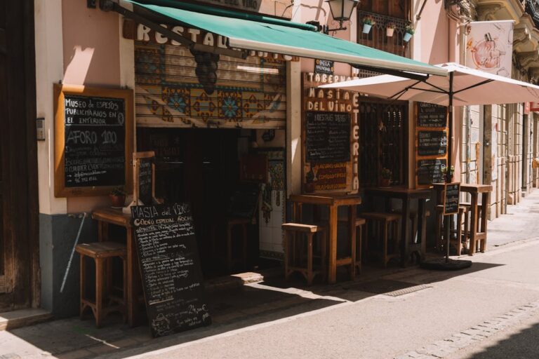 Outdoor cafe on a quiet Spanish street during afternoon siesta hours